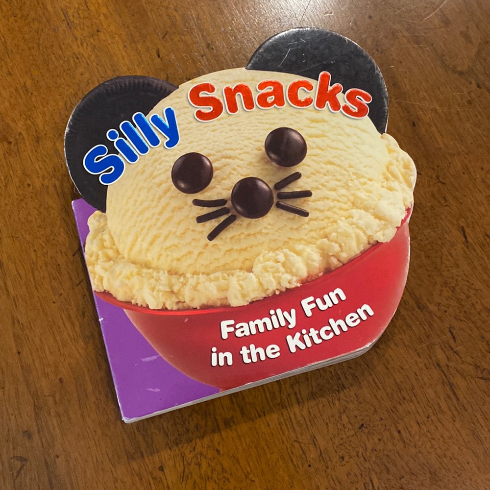 Silly snacks cookbook. Cut out board book. Great for fun in the kitchen.